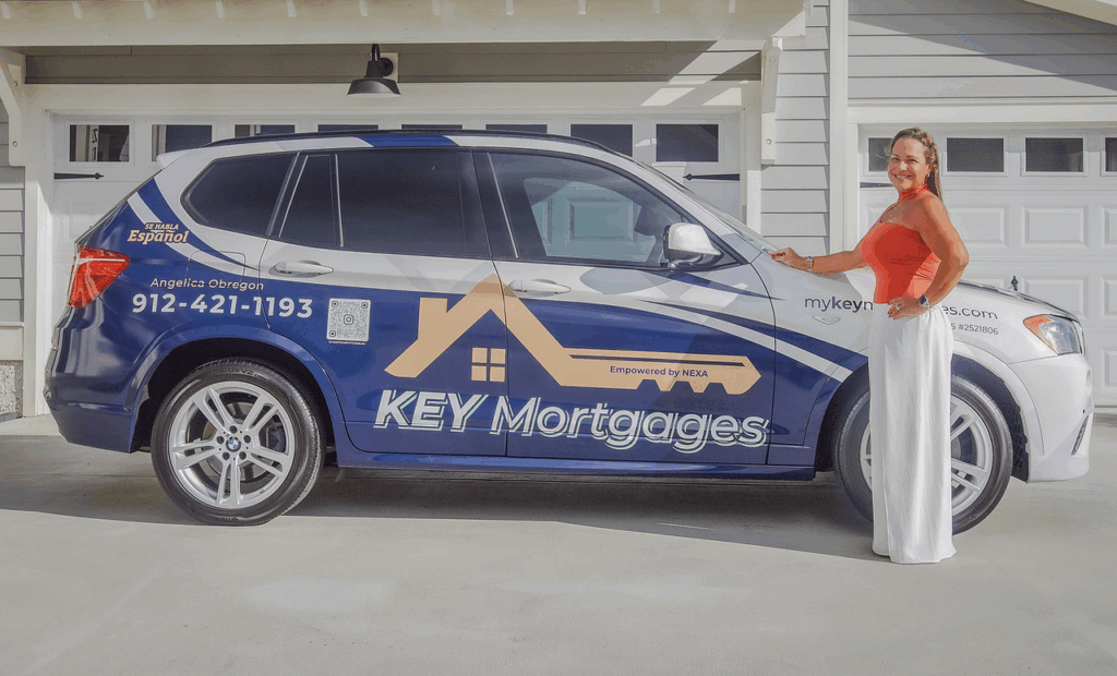 Angelica from Key Mortgages with hand on car, ready to assist clients with their mortgage journey.