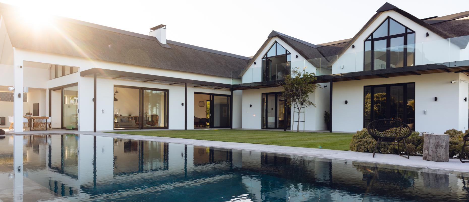 Large luxury house with pool representing high-value mortgage options from Key Mortgages.